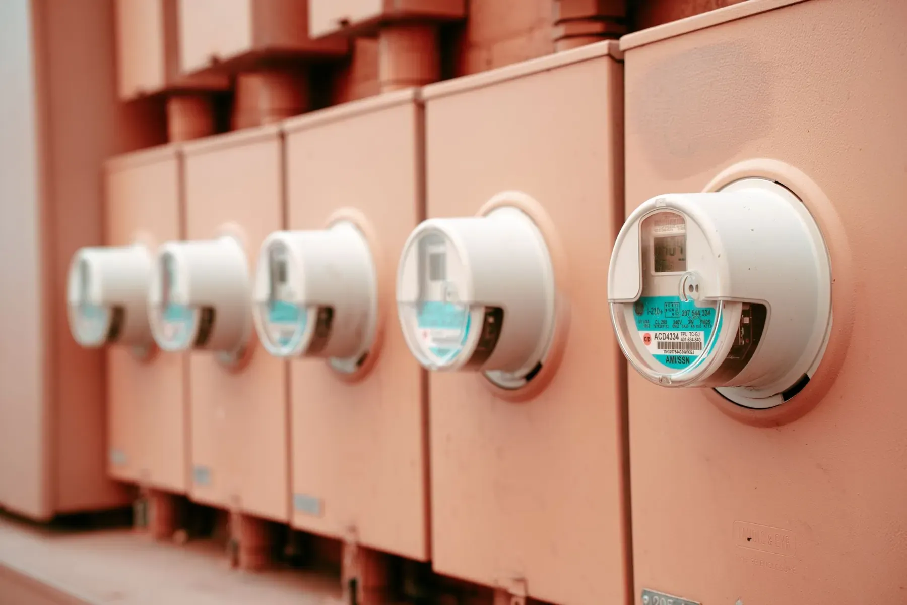 A row of electricity meters measuring a building's energy consumption