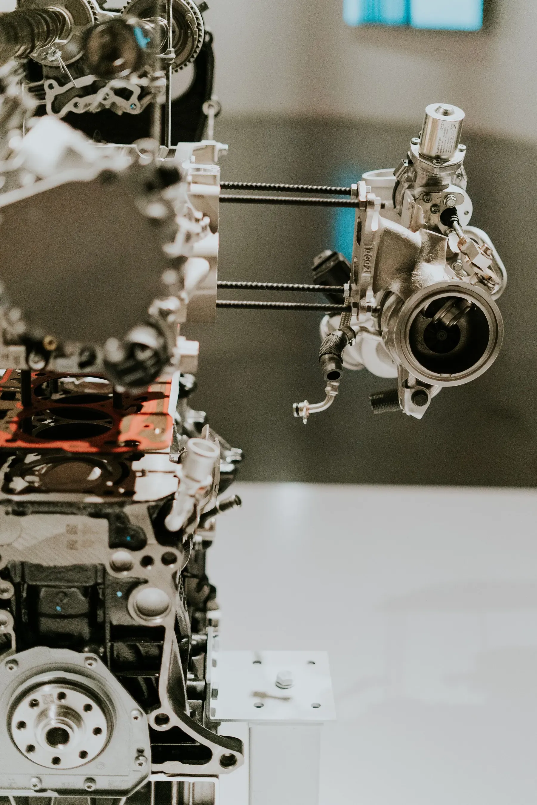 A mechanical engine assembly and turbocharger unit